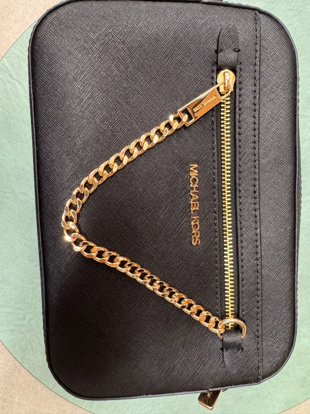 Michael Kors Black Saffiano Crossbody adjustable with Gold Chain Trim stained